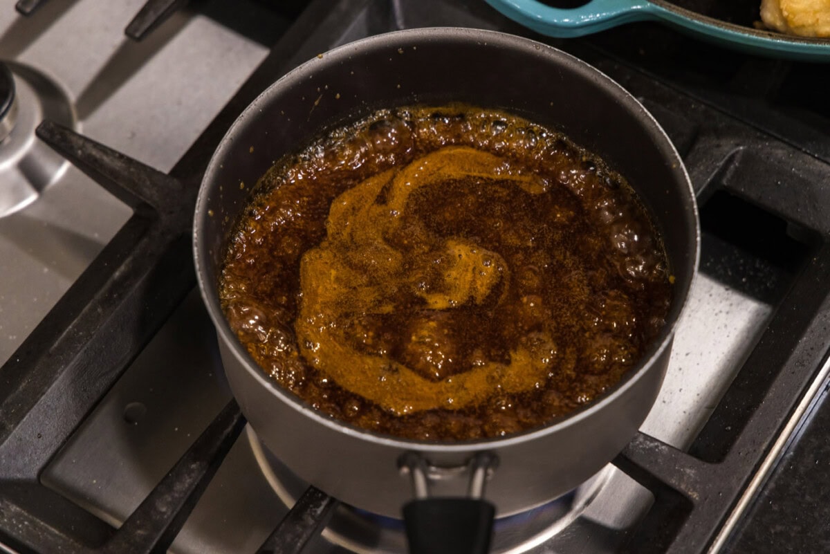 thickened honey garlic sauce in a pot