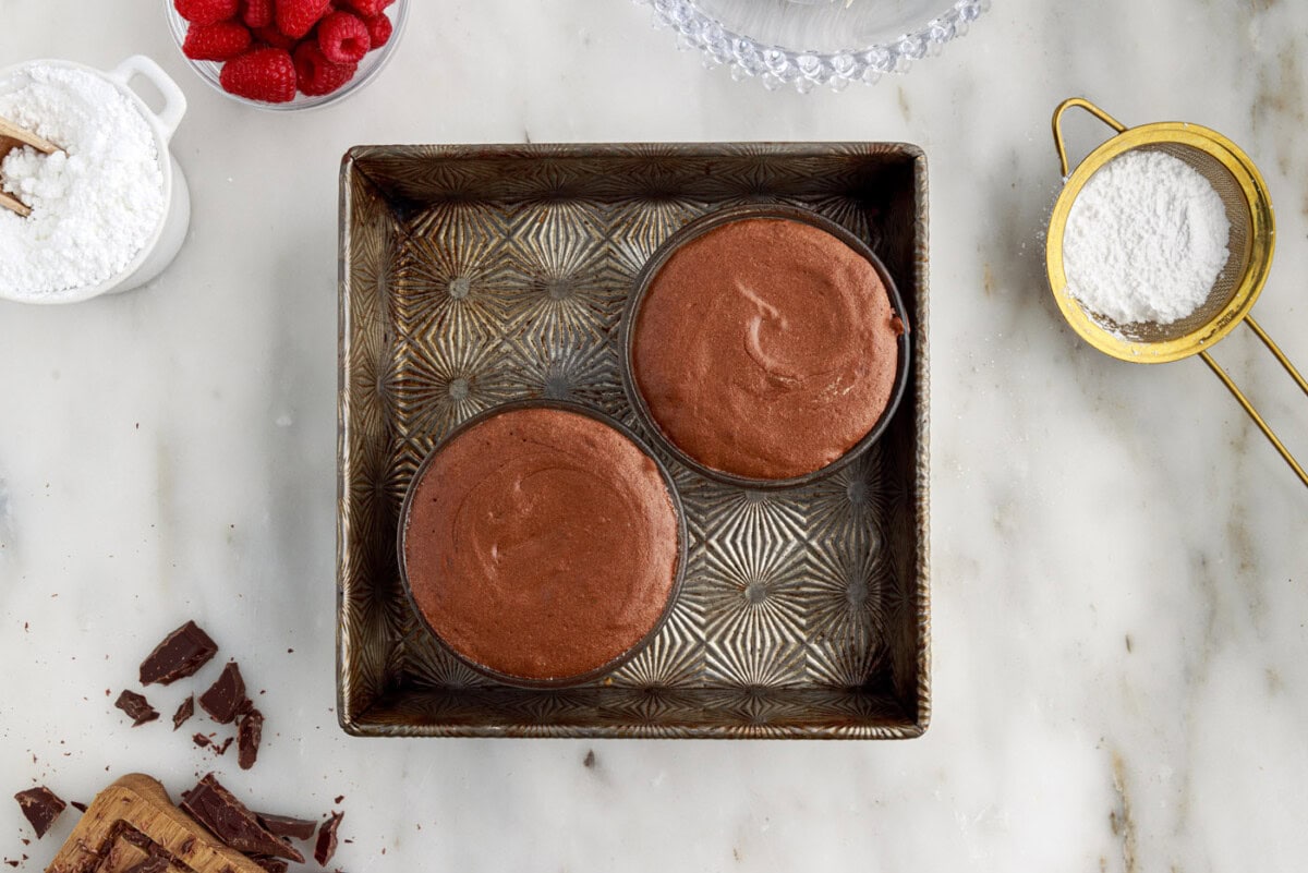 baked lava cakes on a baking sheet