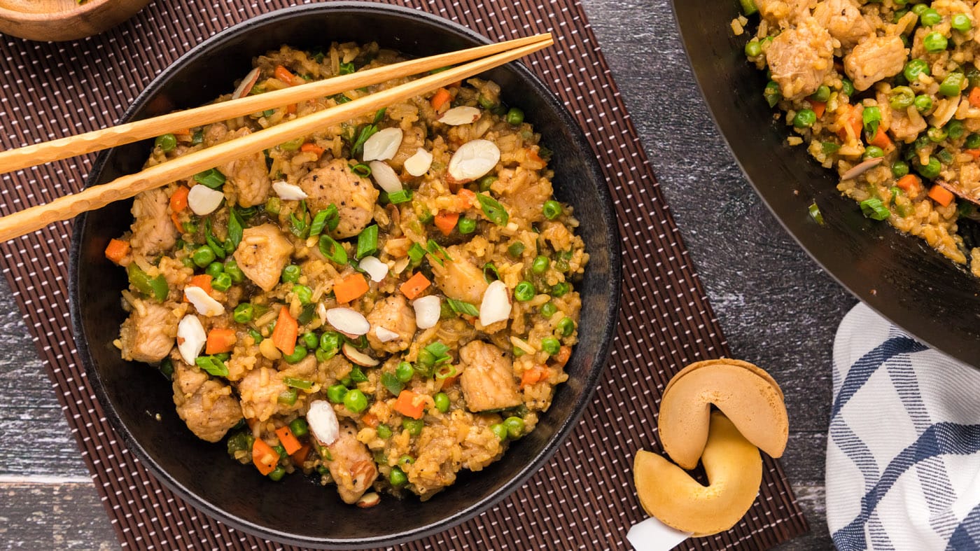 This pork fried rice recipe is quick and easy to make in a skillet at home with the basics of flavor