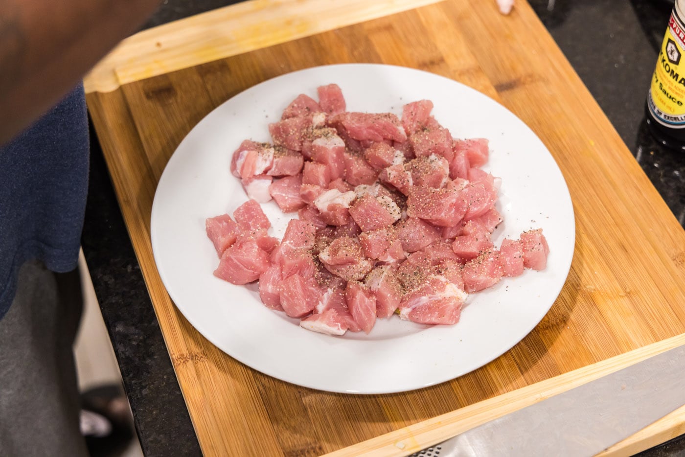 diced boneless pork chops on a plate
