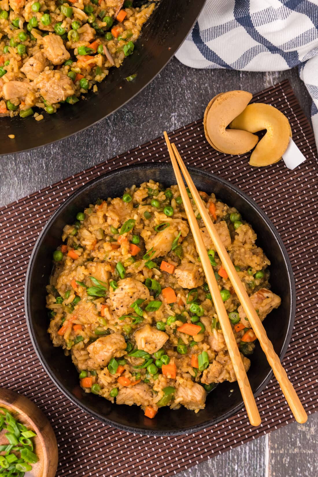 Bowl of Pork Fried Rice with chopsticks over the bowl