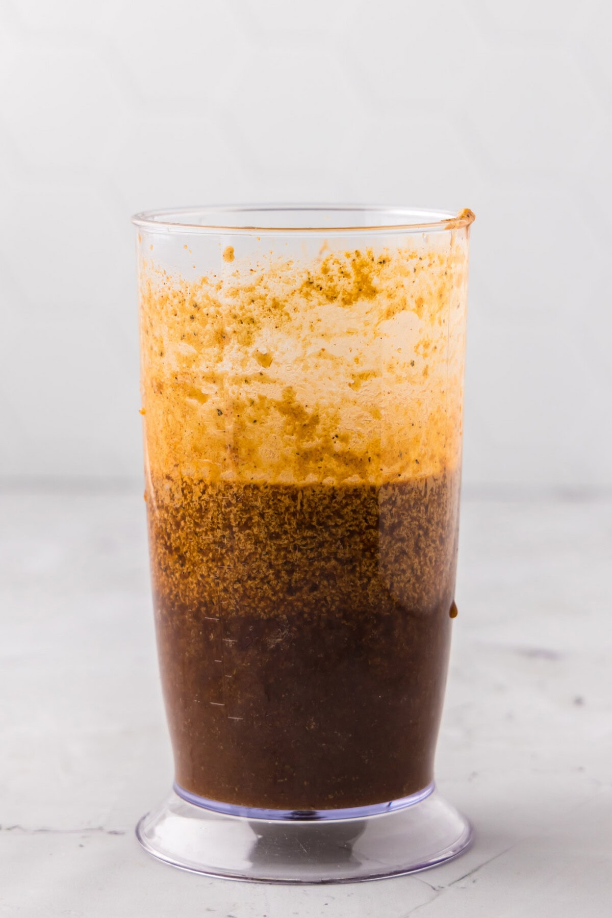blended steak marinade in a glass