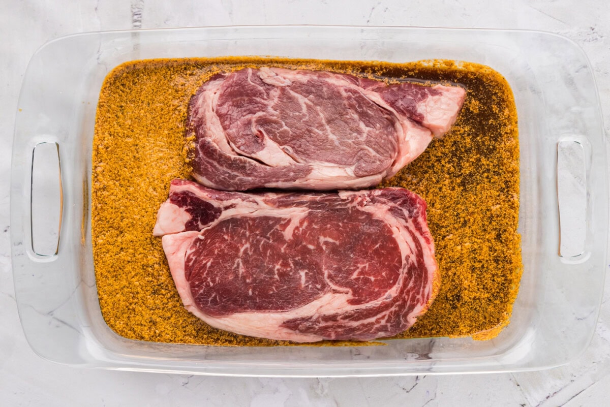 ribeye steak soaking in marinade