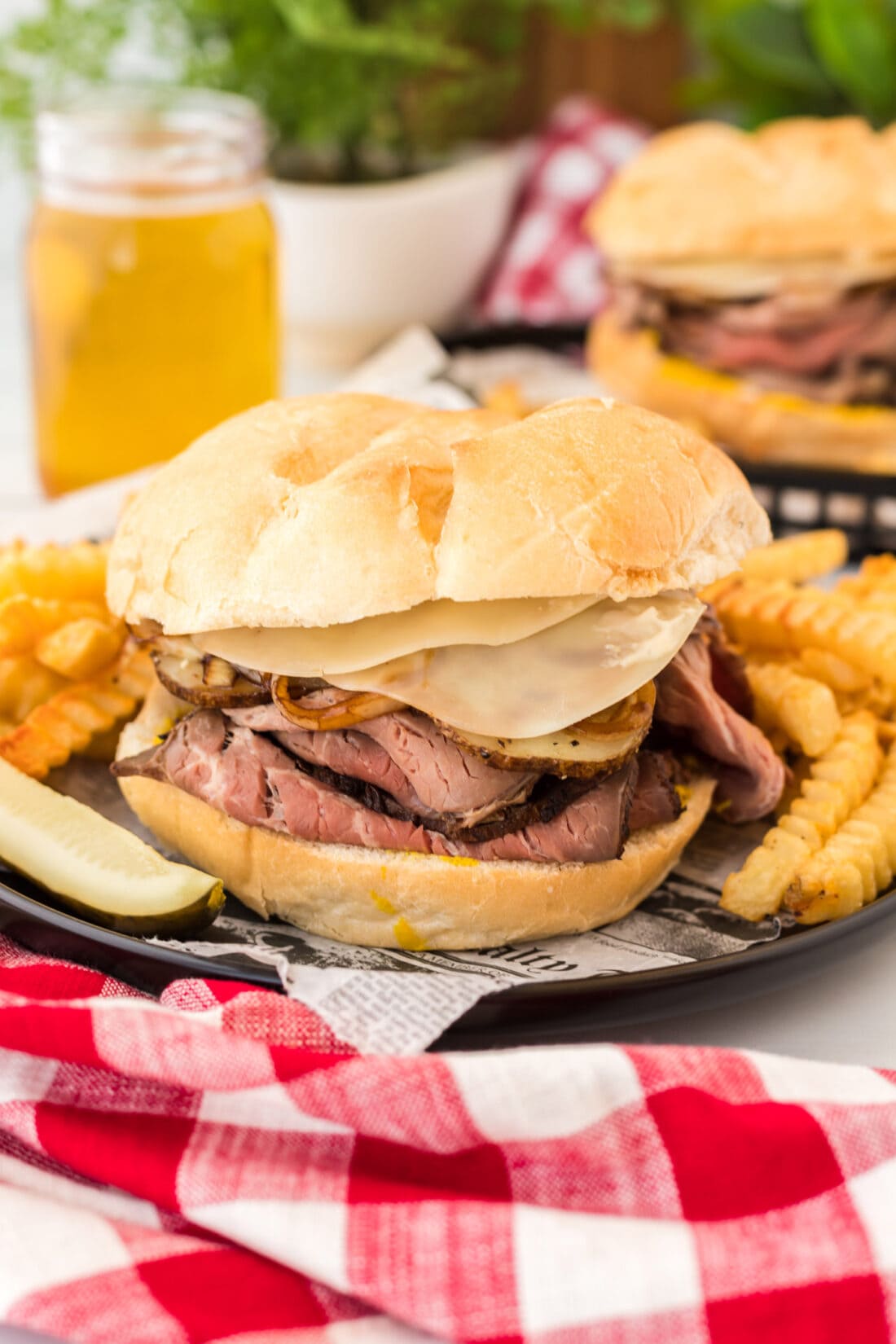 Roast Beef Sandwich on a plate with crinkle cut fries