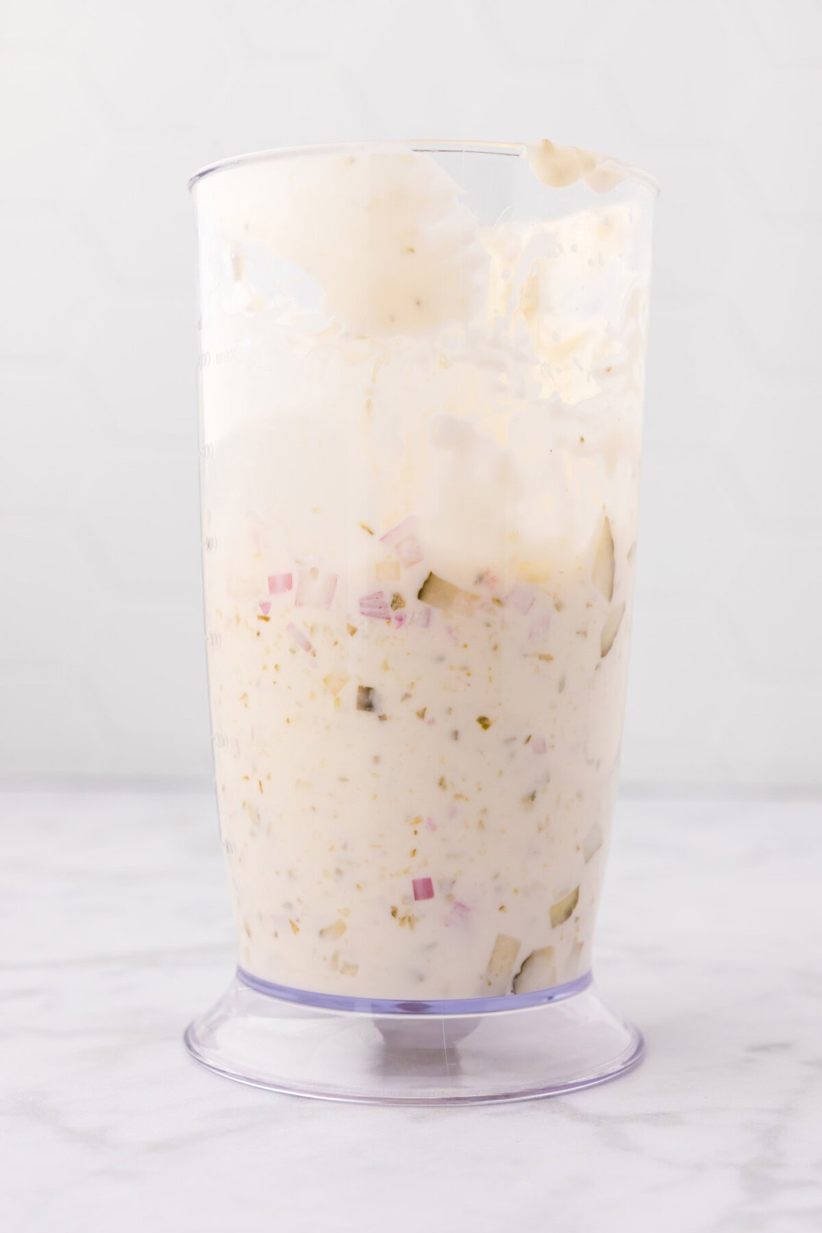 tartar sauce in a mixing container