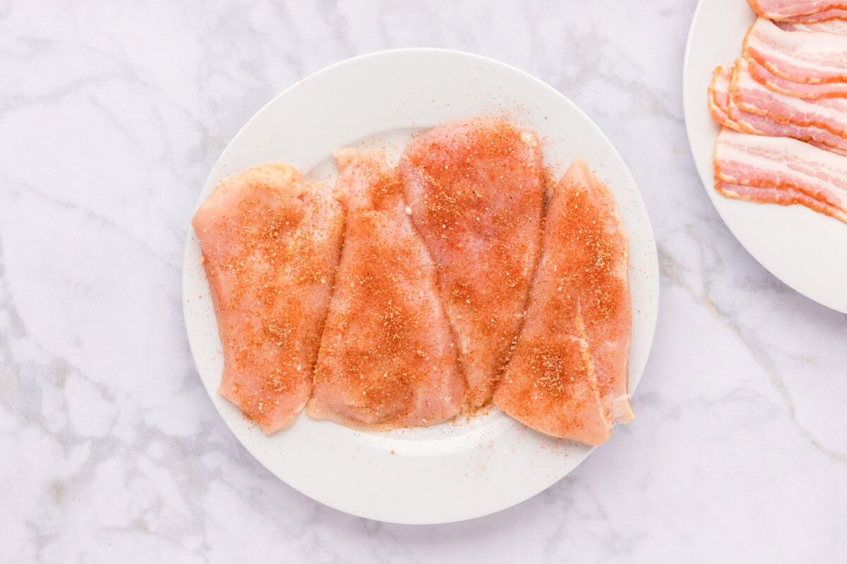 seasoned chicken breasts on a plate