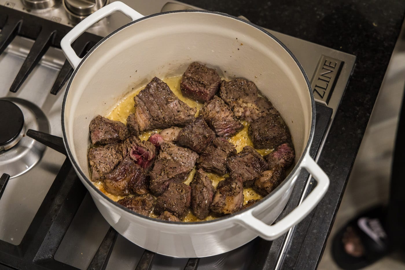 seared beef chuck roast in a dutch oven