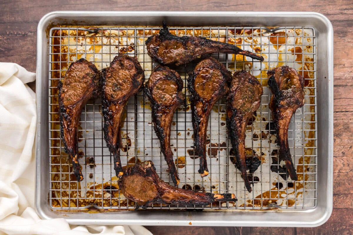 broiled lamb chops on a baking sheet