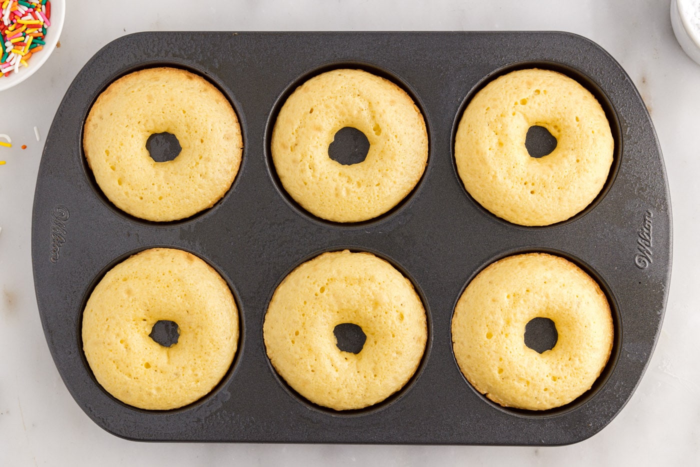 baked cake mix donuts in a pan