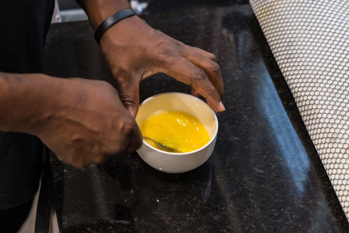 whisking eggs in a bowl