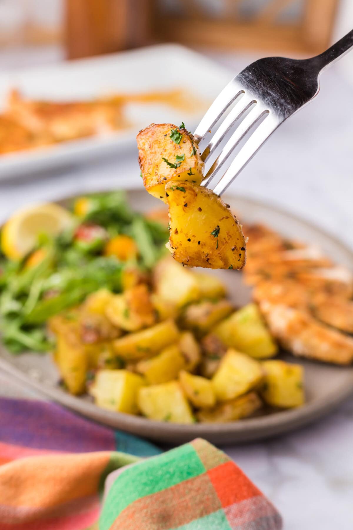 Garlic Roasted Potatoes on a fork