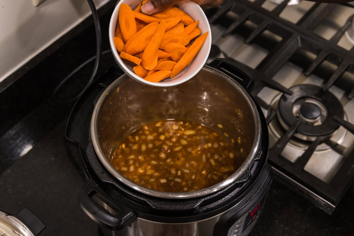 adding carrots to beef stew
