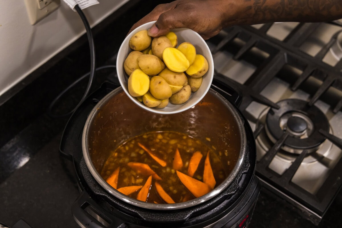 adding Yukon gold potatoes to beef stew