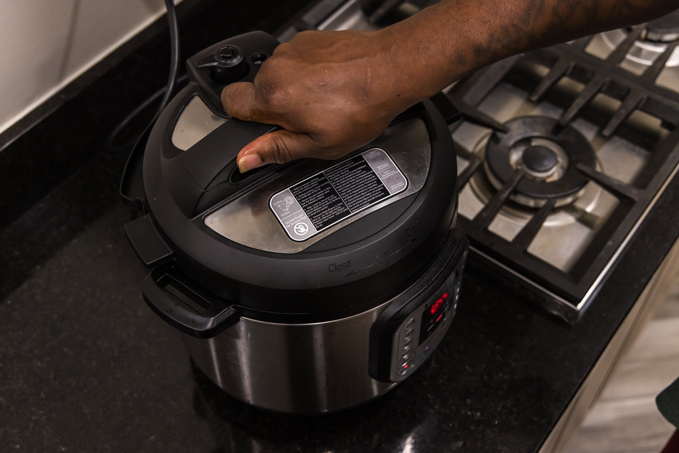 hand sealing the instant pot lid