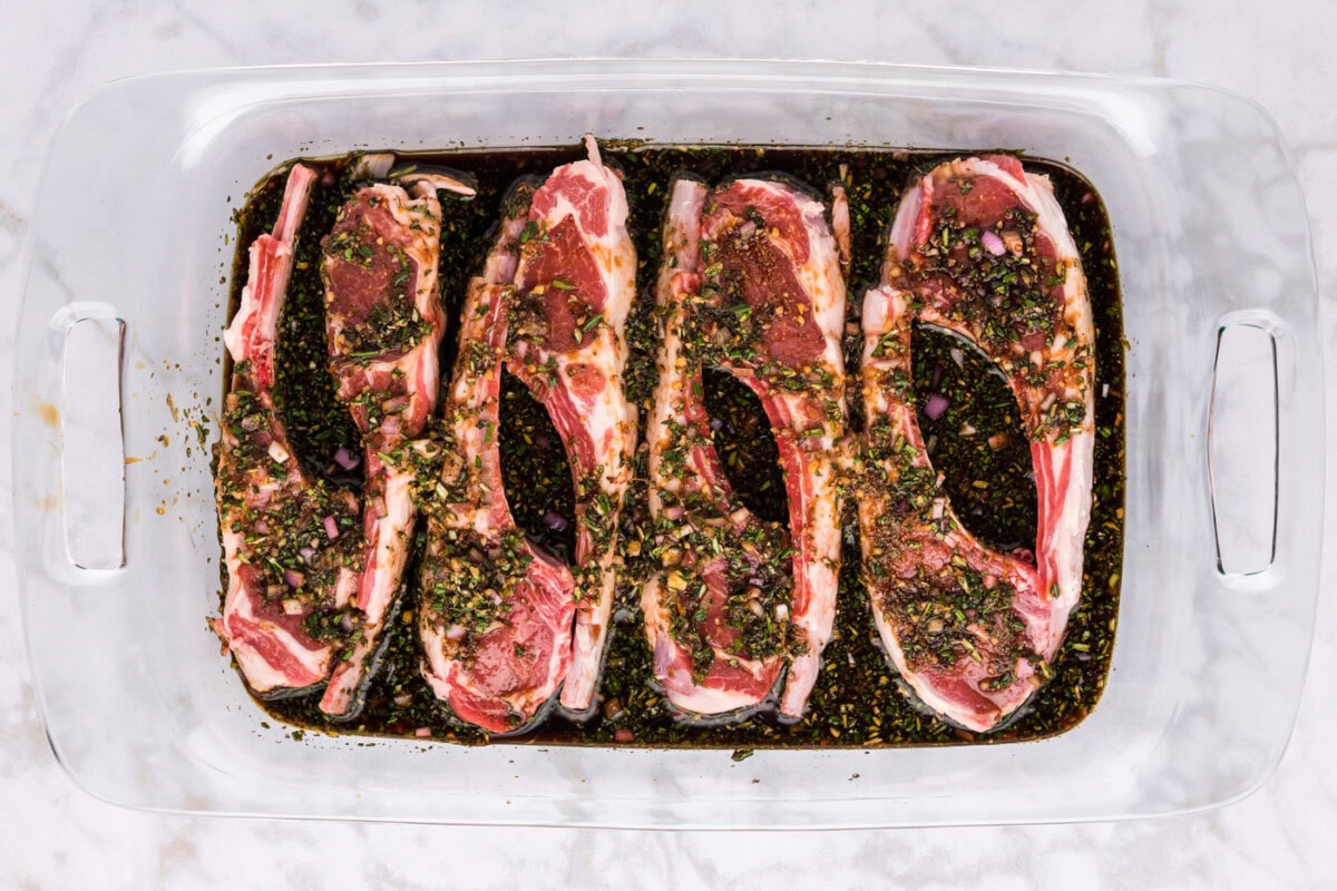 lamb chops sitting in marinade