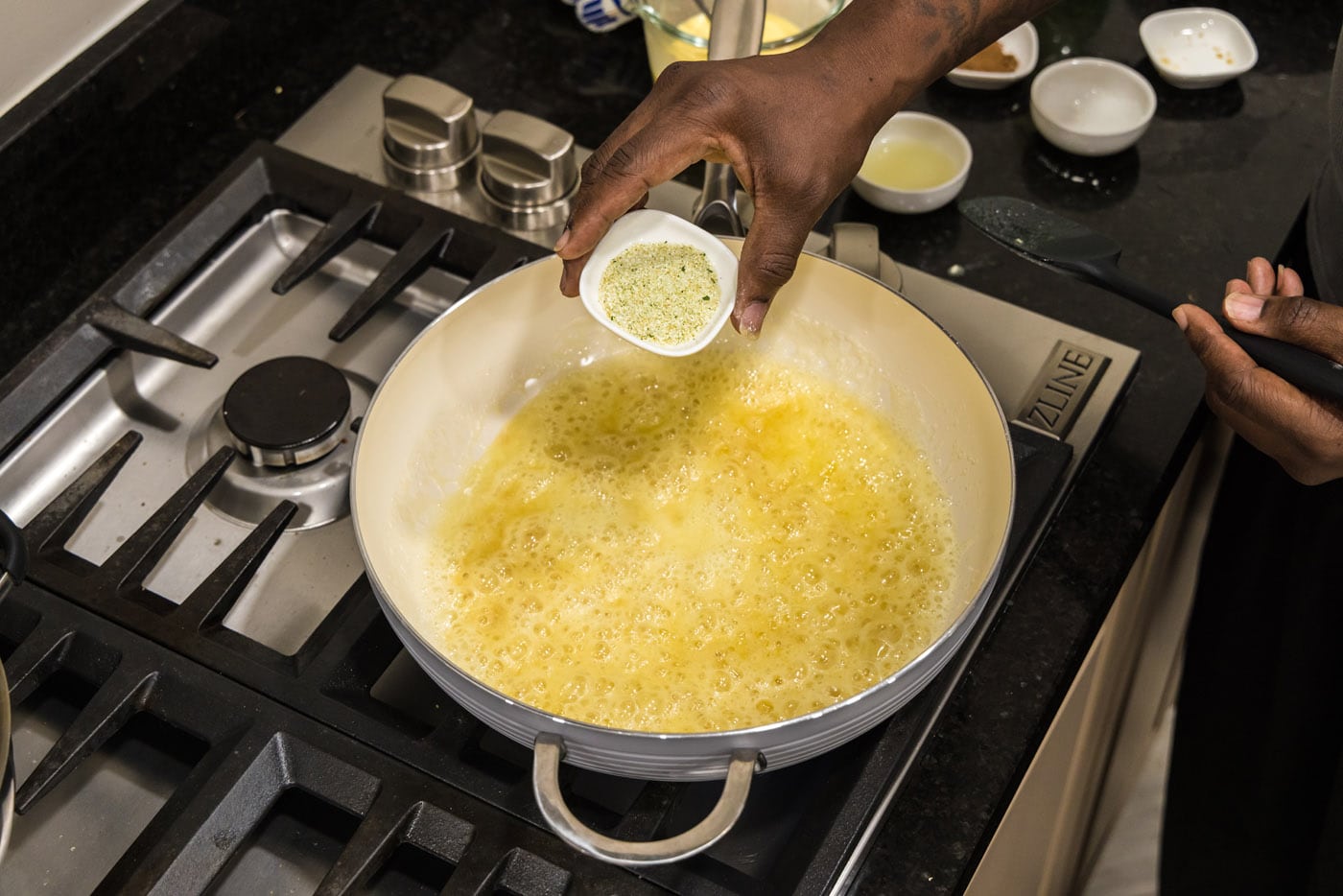 Adding garlic salt to skillet with butter mixture