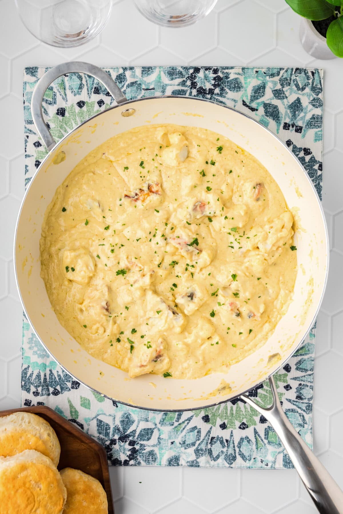 Skillet of Lobster Newburg with biscuits on the side