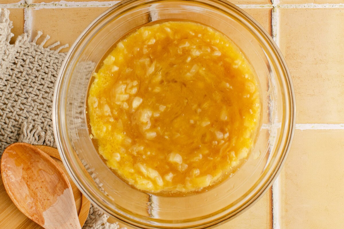 mixed pineapple and brown sugar ingredients in a bowl