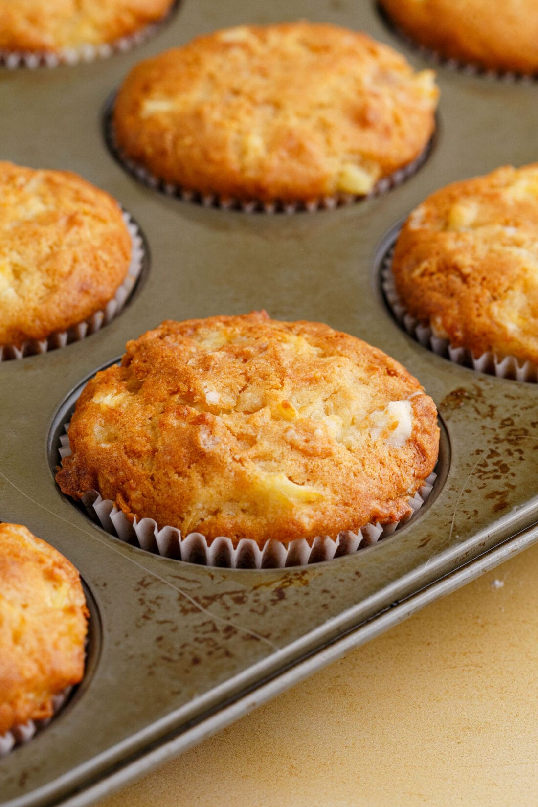 Pineapple Muffins in a muffin pan 