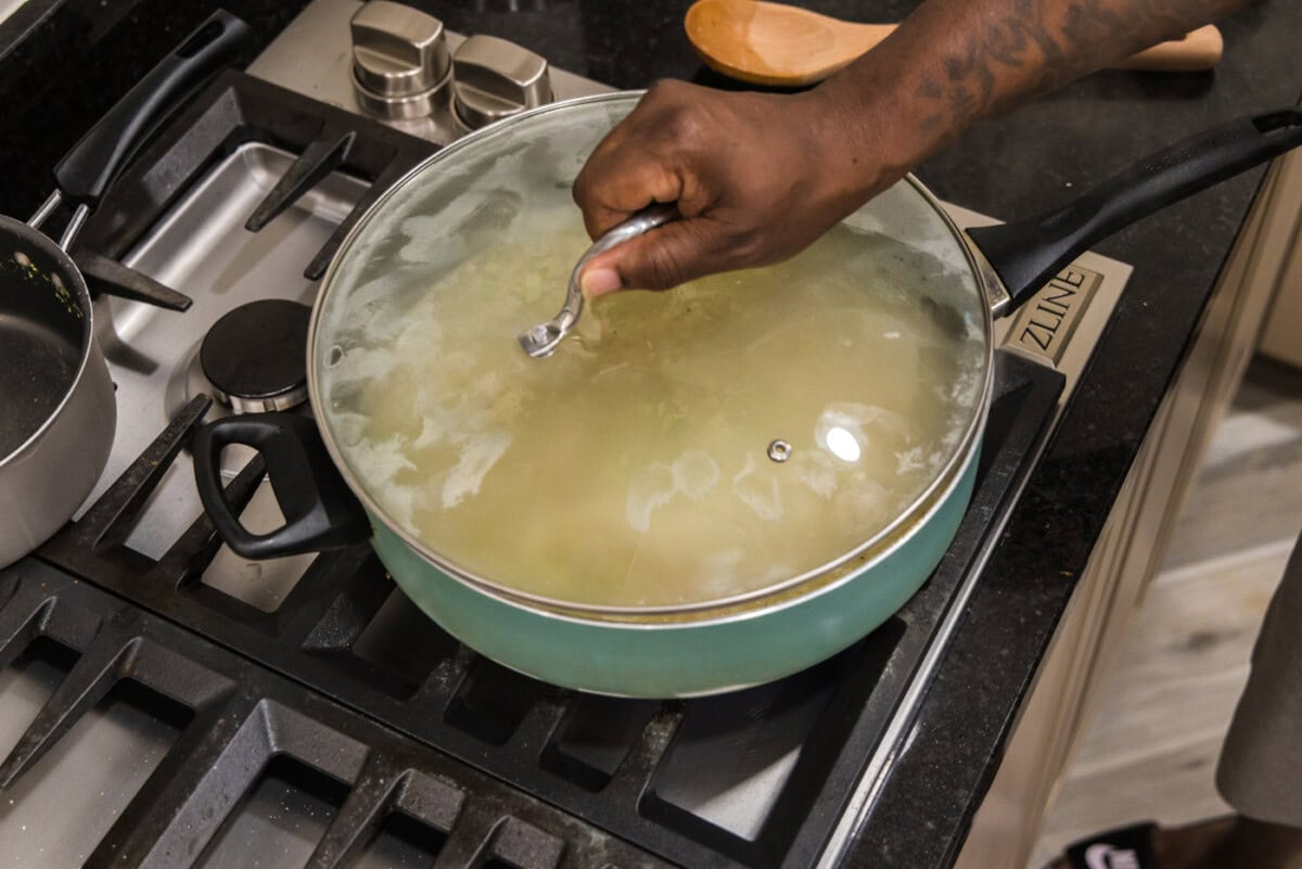 covering rice pilaf in a skillet