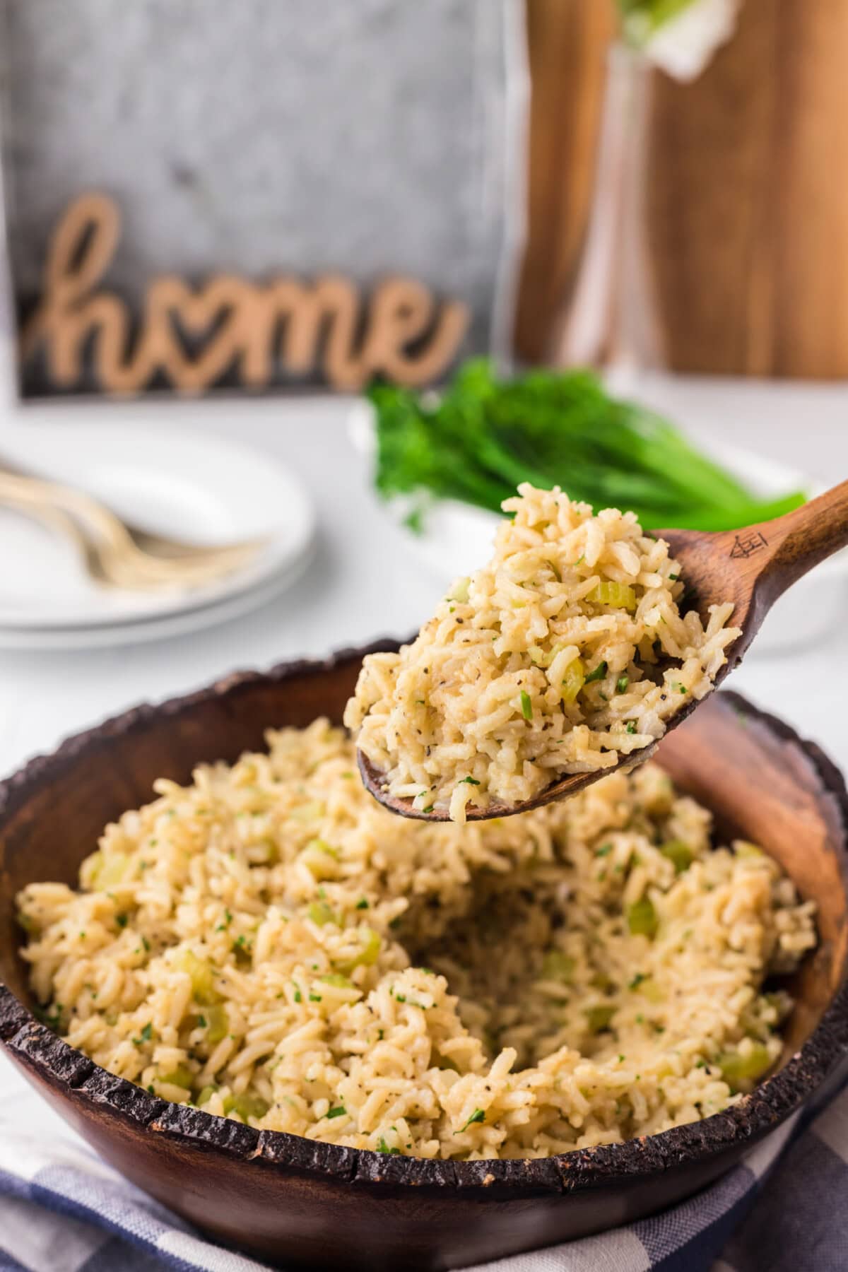 Spoonful of Rice Pilaf being lifted out of a bowl of Rice Pilaf