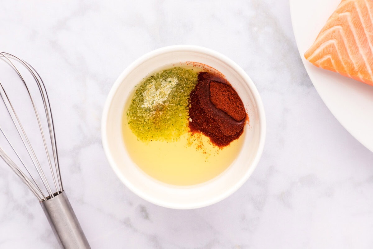 olive oil, paprika, and garlic salt in a bowl