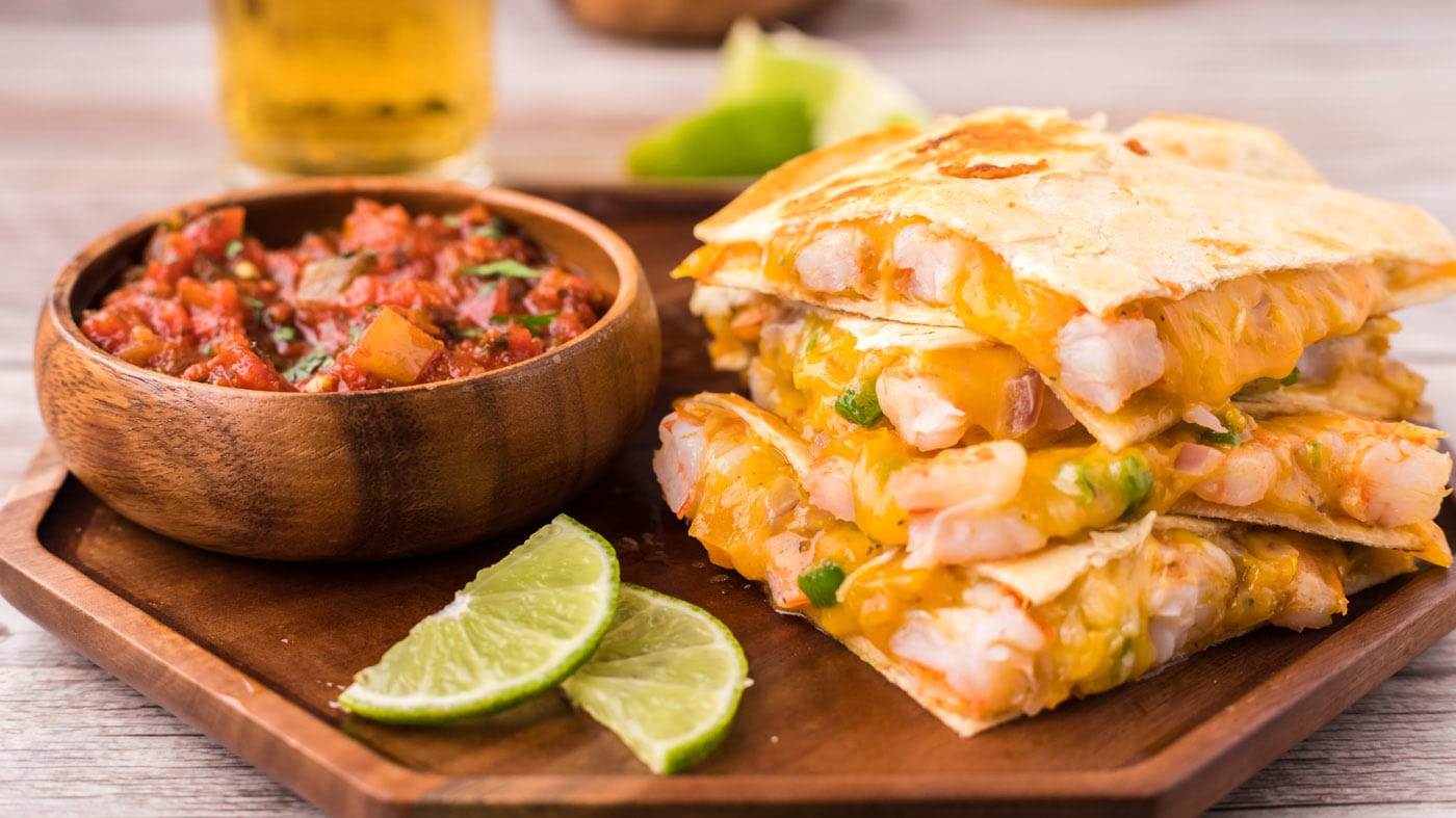 Between the juicy shrimp, tender bell pepper and onions, melty cheese, and crispy tortilla, this shr