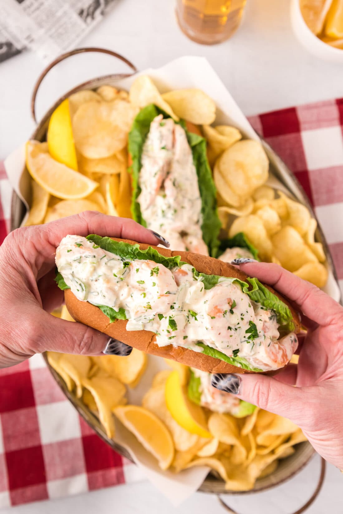Shrimp Roll held by two hands