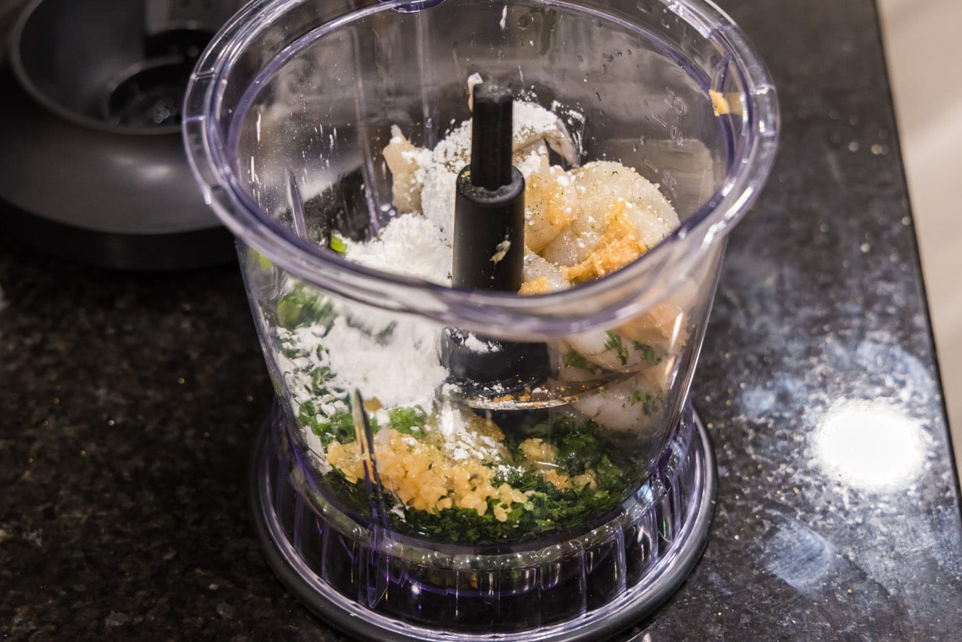 blending shrimp toast ingredients in a food processor