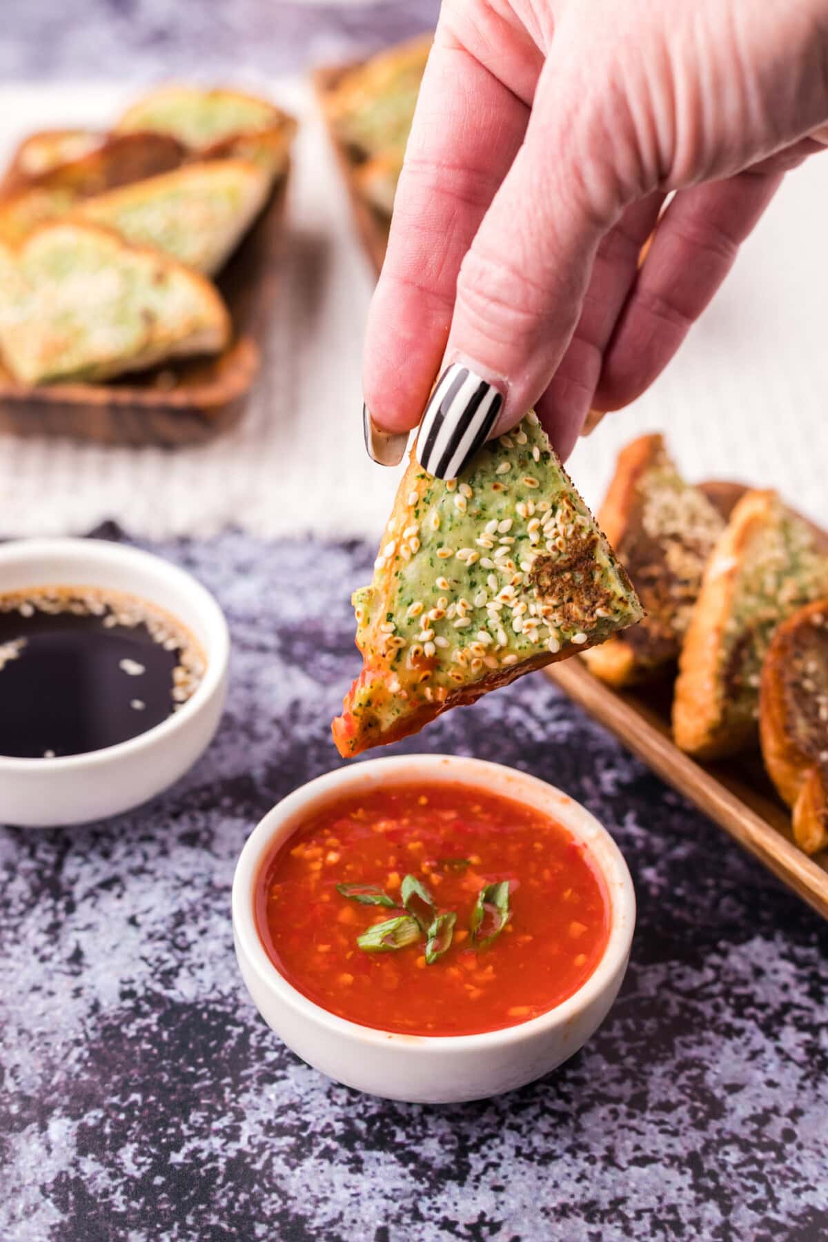 Shrimp Toast dipped in sweet chili sauce