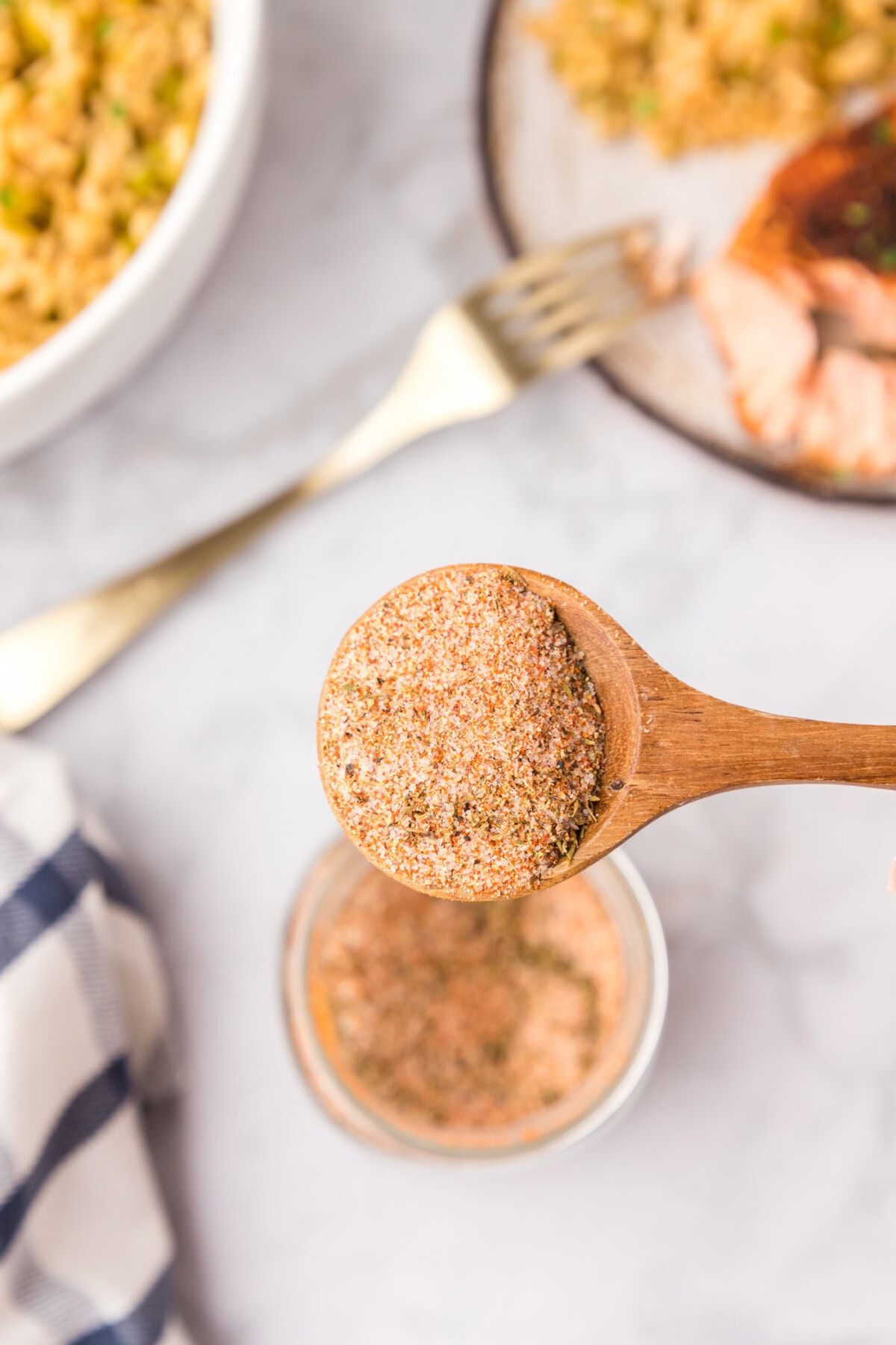 Overhead photo of a spoonful of Cajun Seasoning