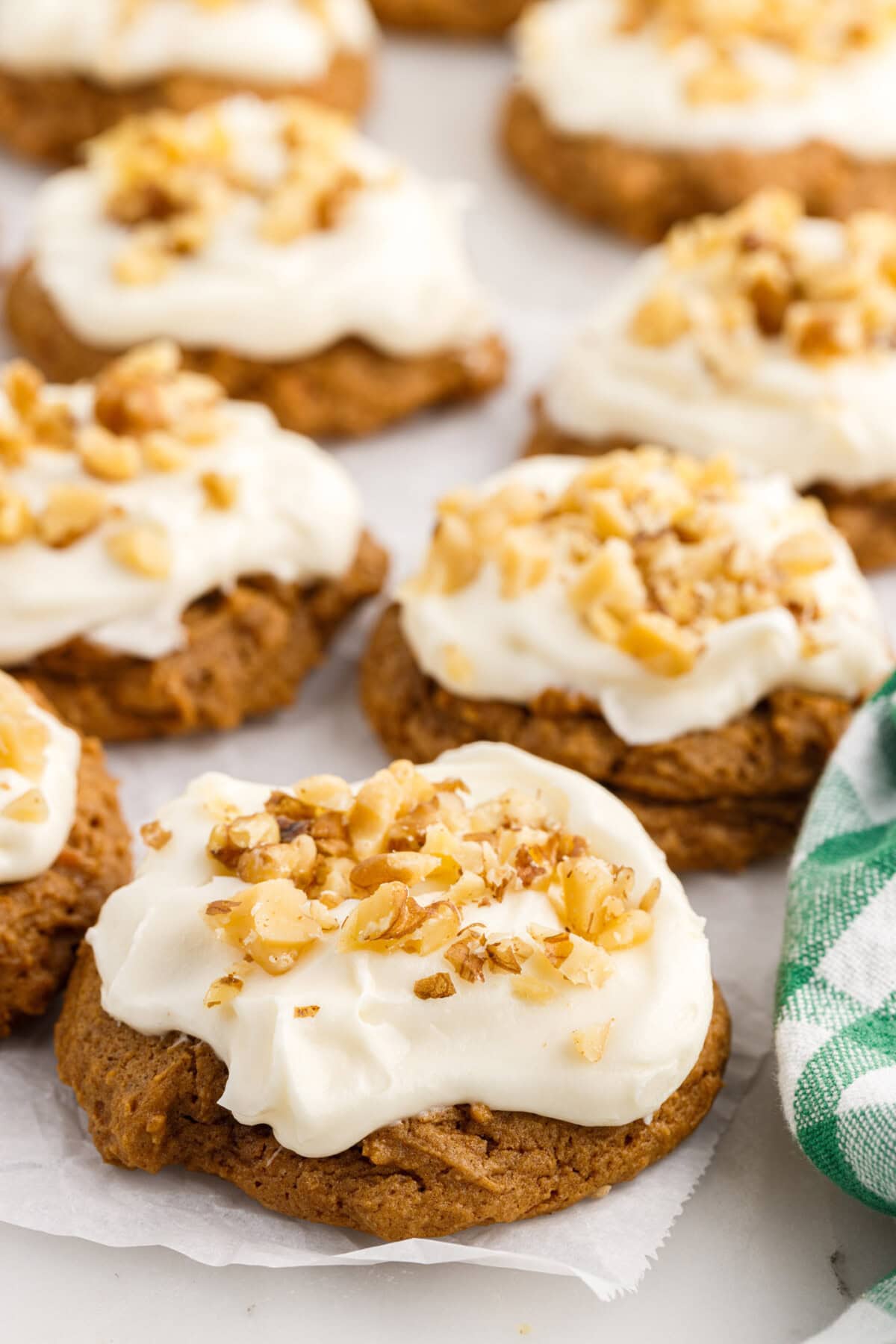 Close up of Carrot Cake Mix Cookies on a sheet of parchment paper