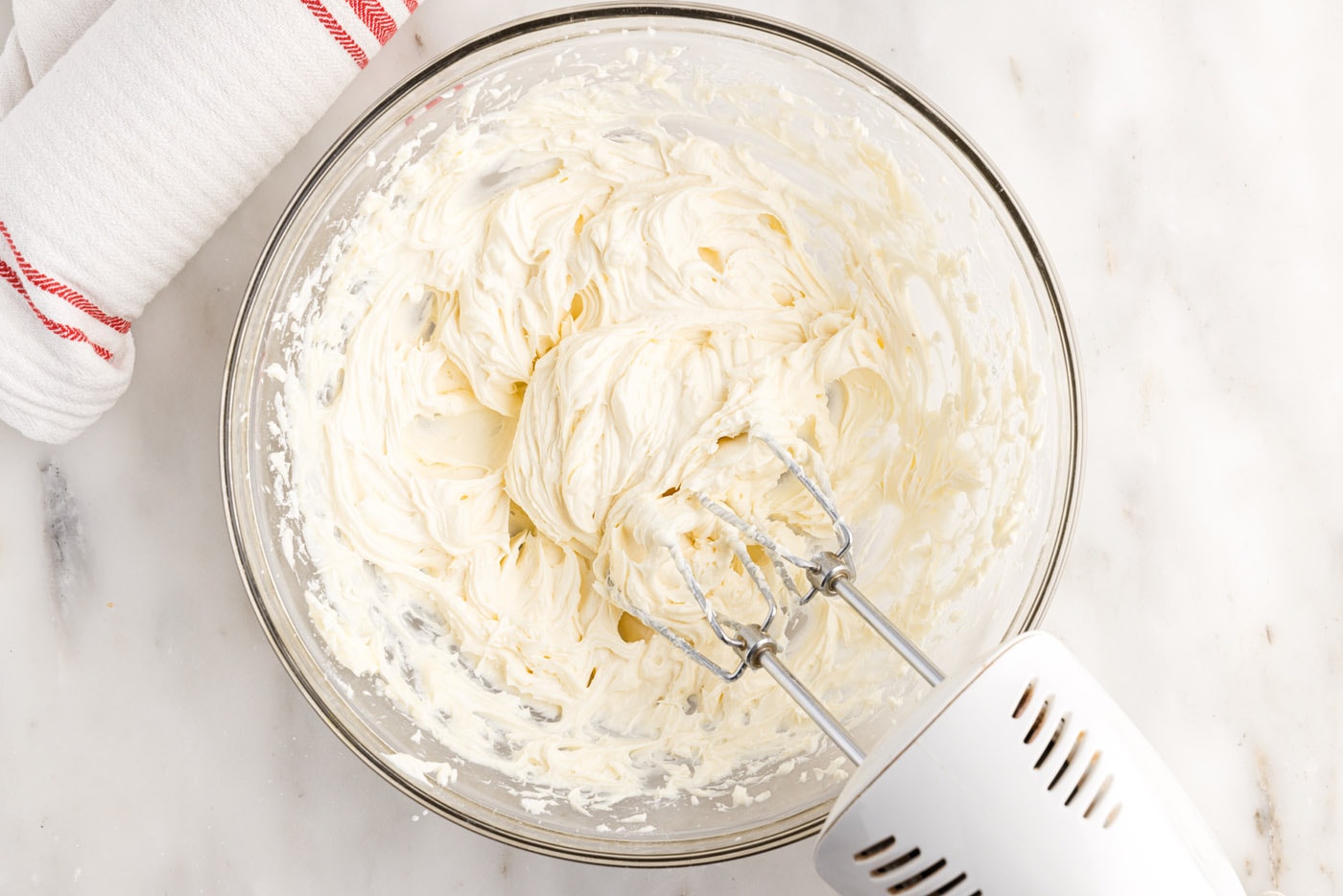 cream cheese filling in a bowl of a mixer