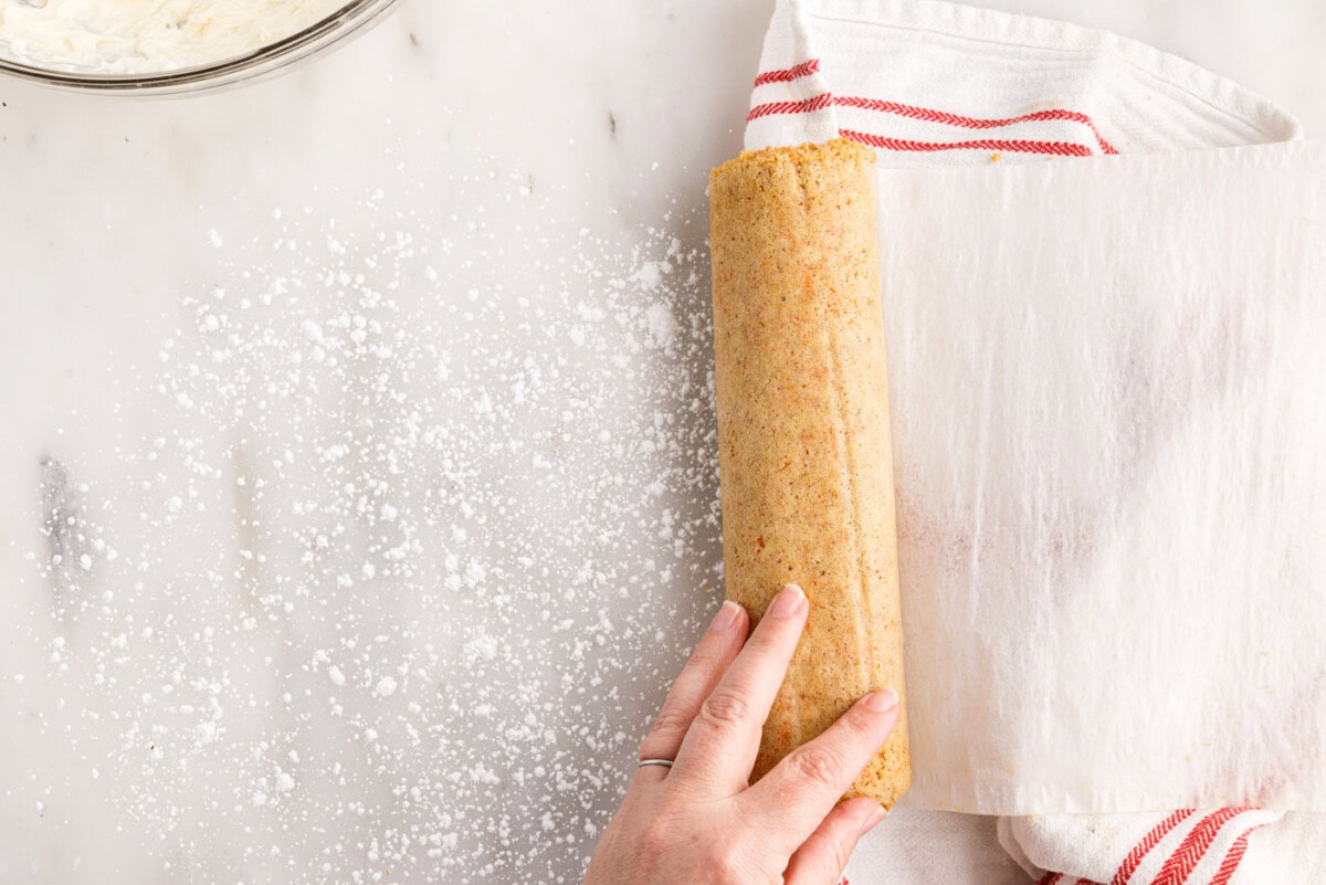 unrolling carrot cake roll