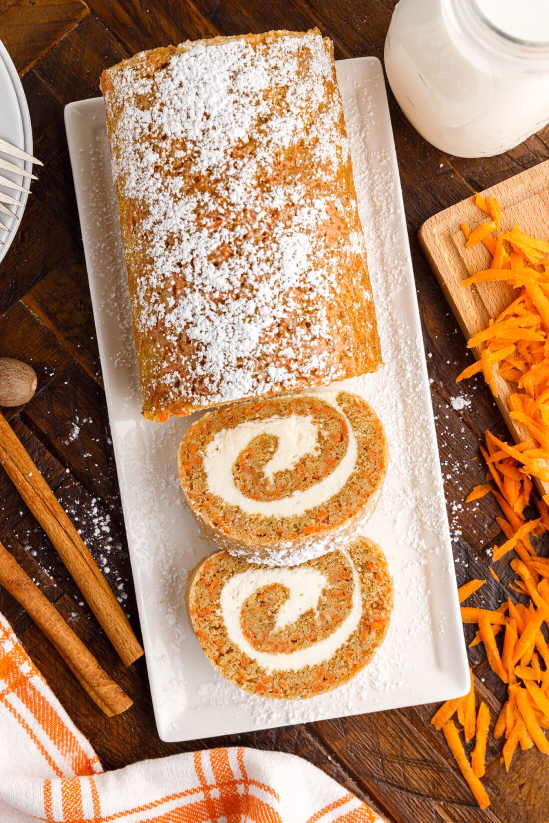 Sliced Carrot Cake Roll on a serving platter