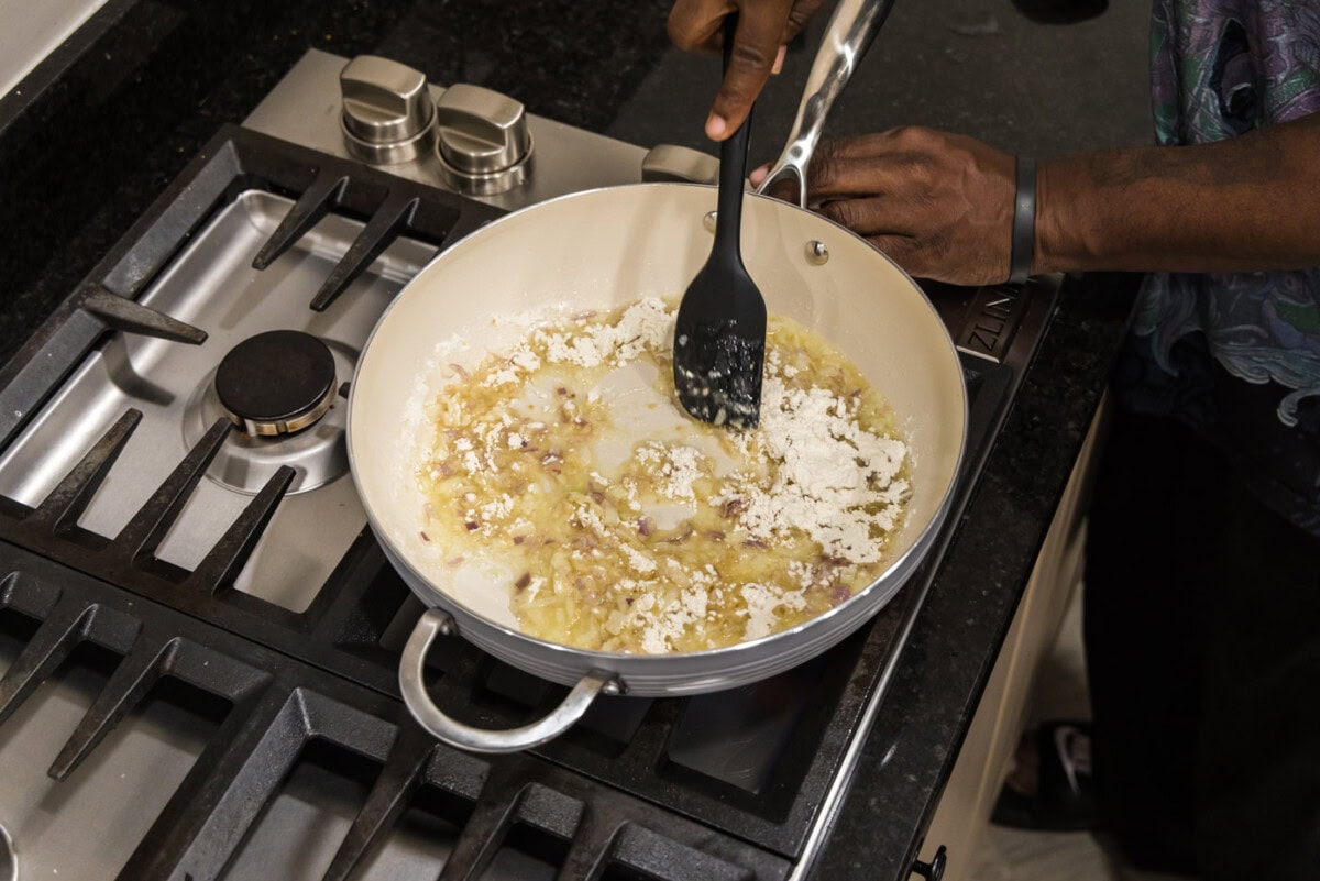 spatula stirring roux in a skillet