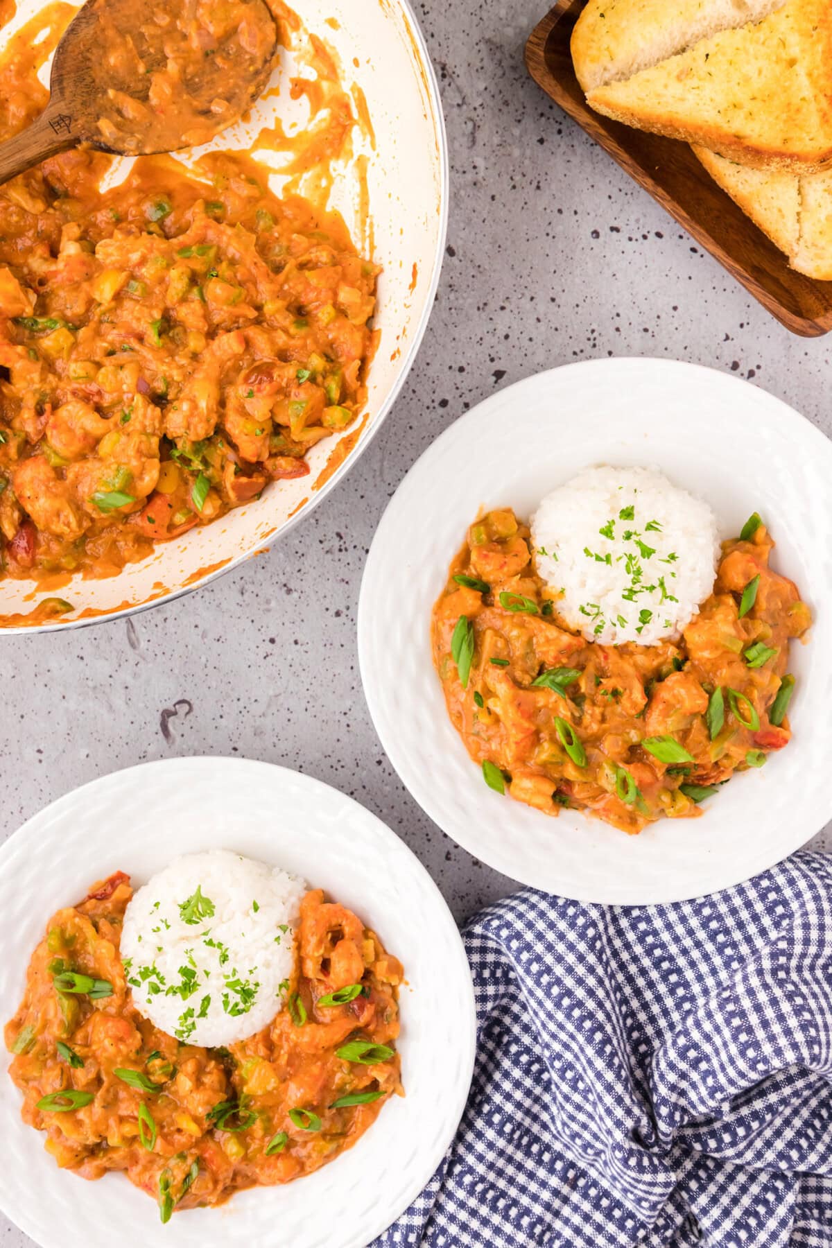 Two bowls of Crawfish Etoufee served with rice