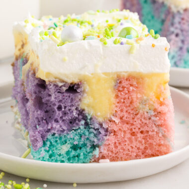 Close up photo of a piece of Easter Poke Cake