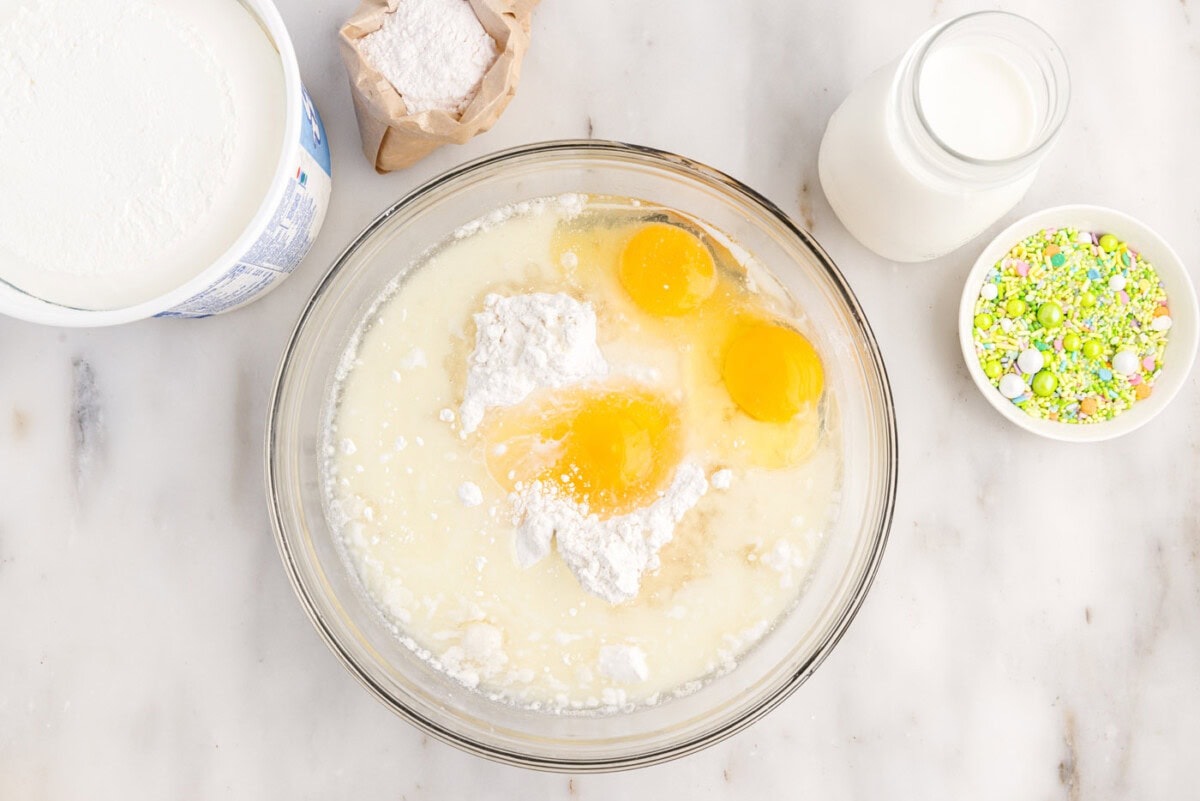 eggs, oil, milk, and cake mix in a bowl