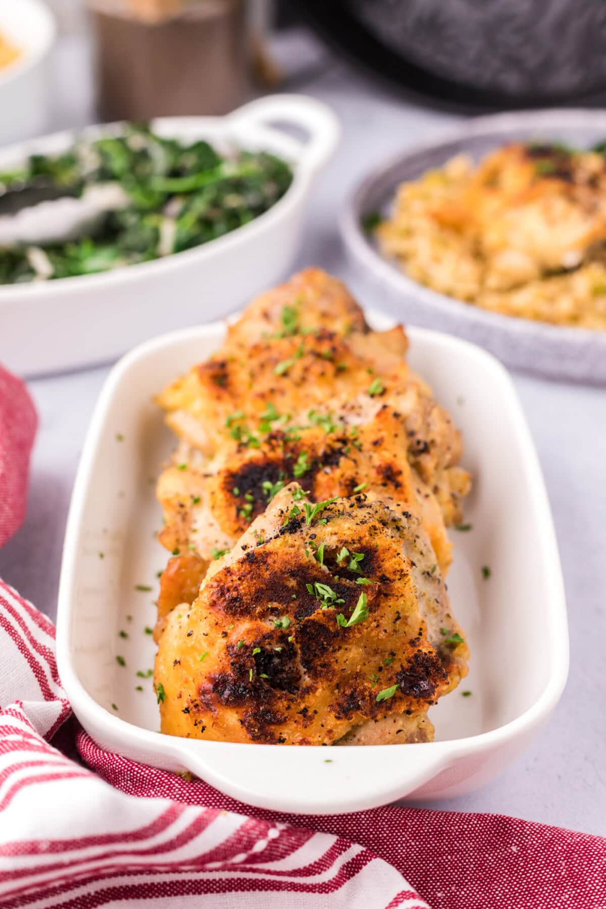 Instant Pot Chicken Thighs in a serving dish