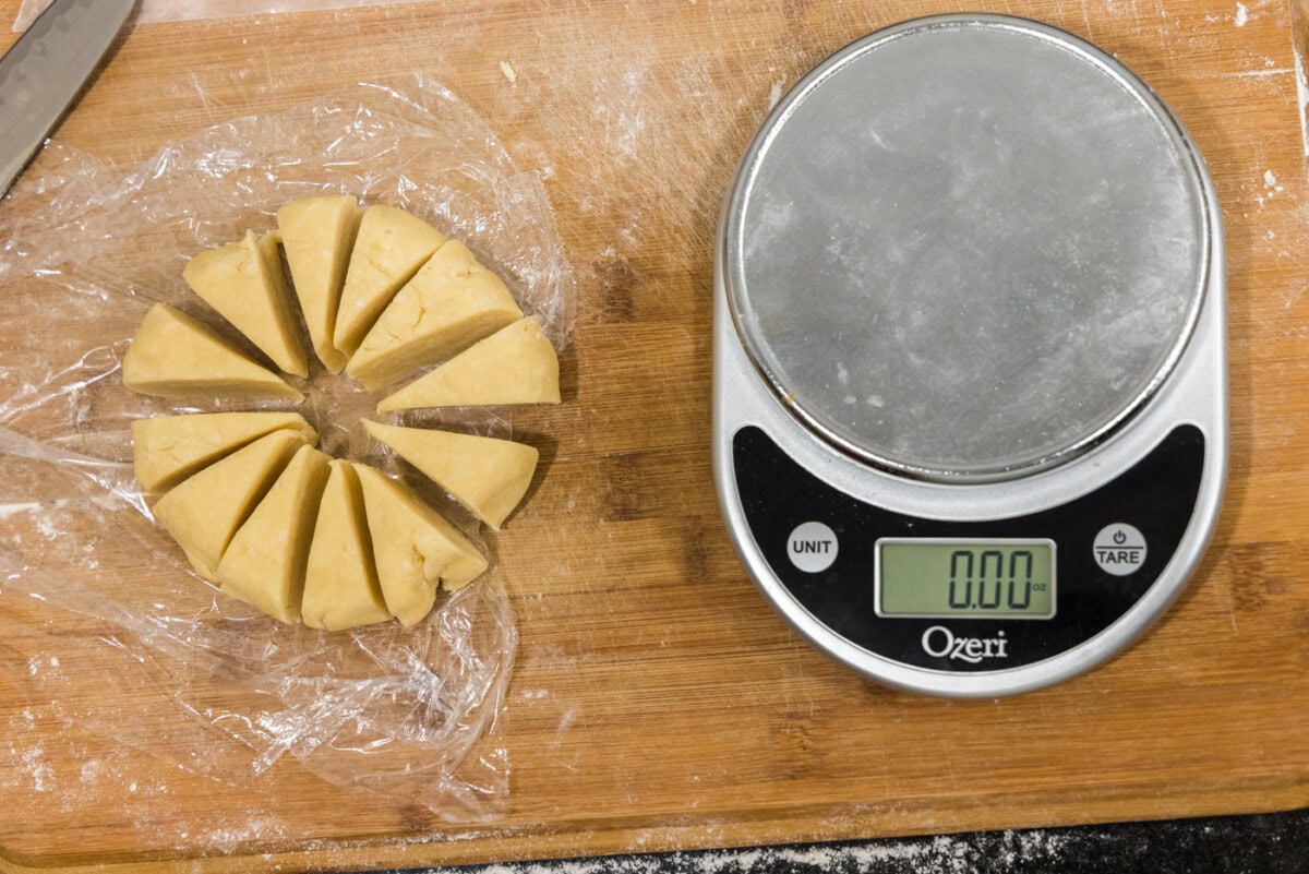 slicing dough into triangles