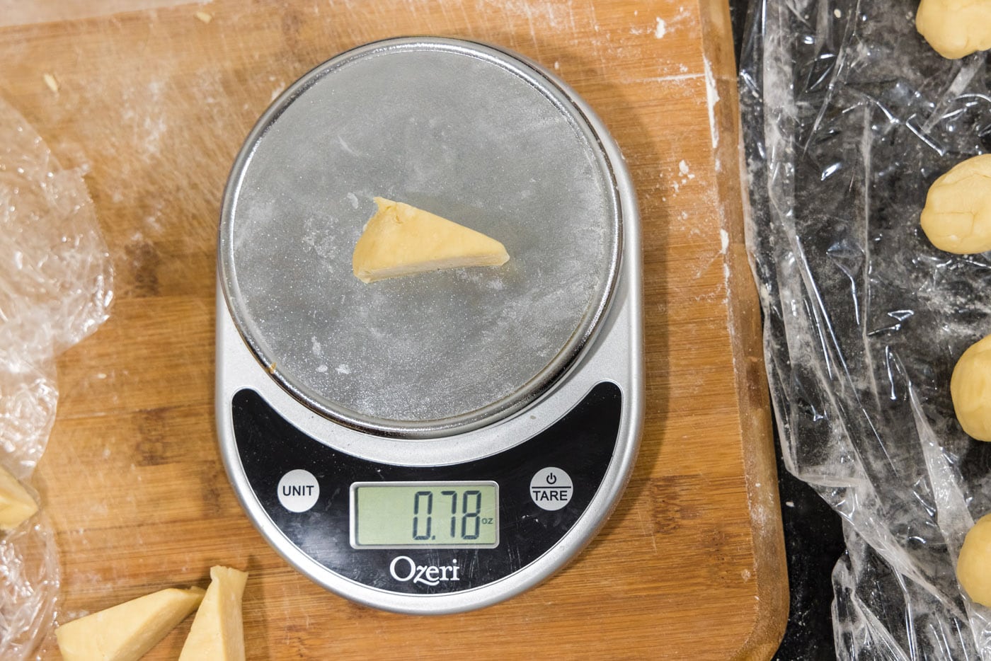 weighing dough triangles