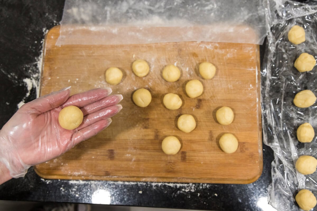 rolling dough into small balls