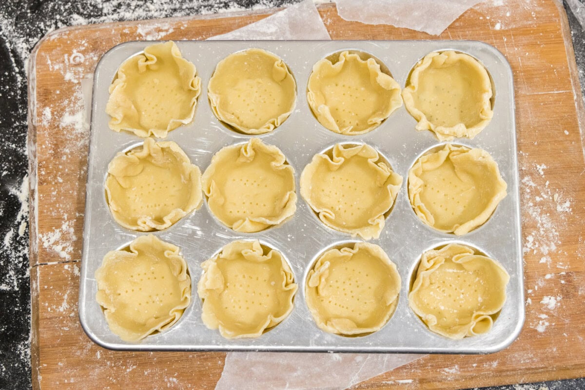 mini pie dough in muffin pan