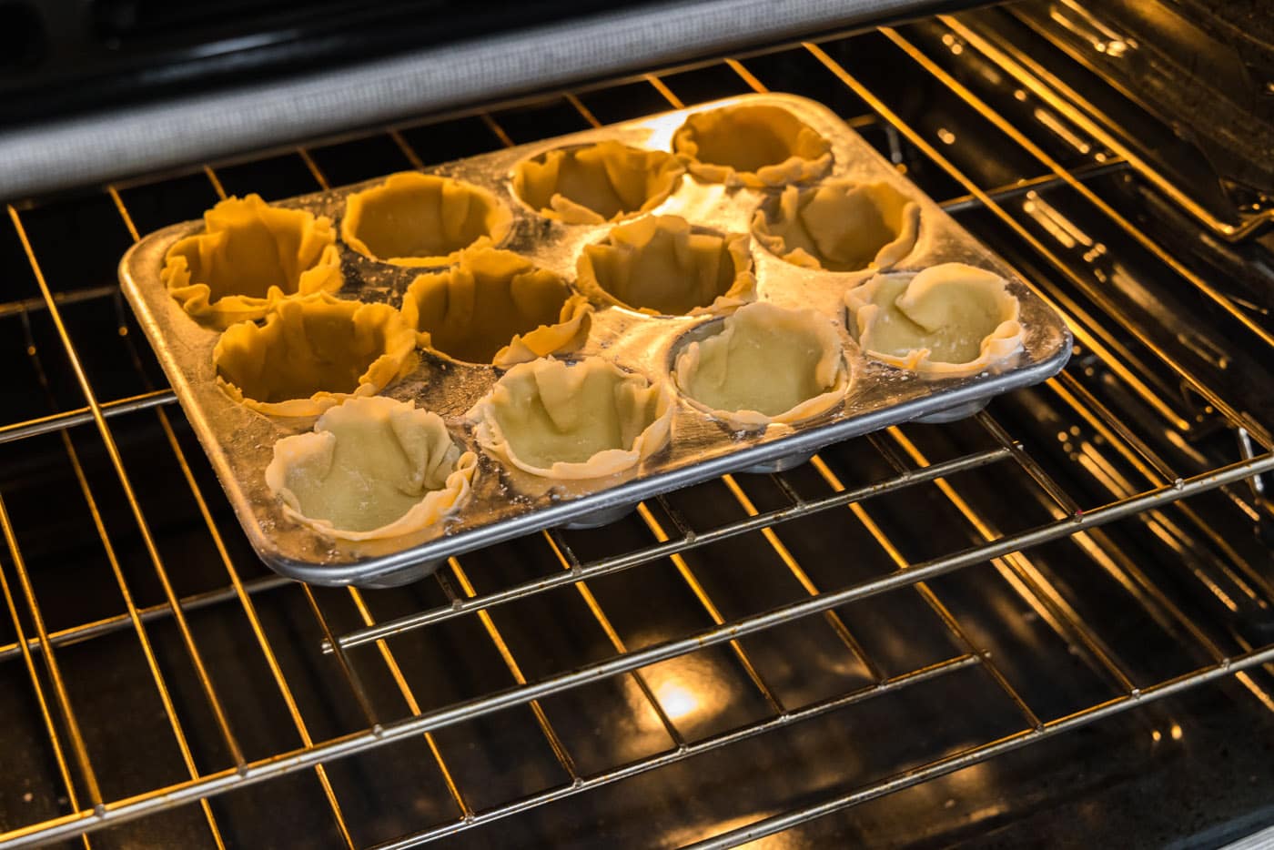 baking mini pie crusts in a muffin pan