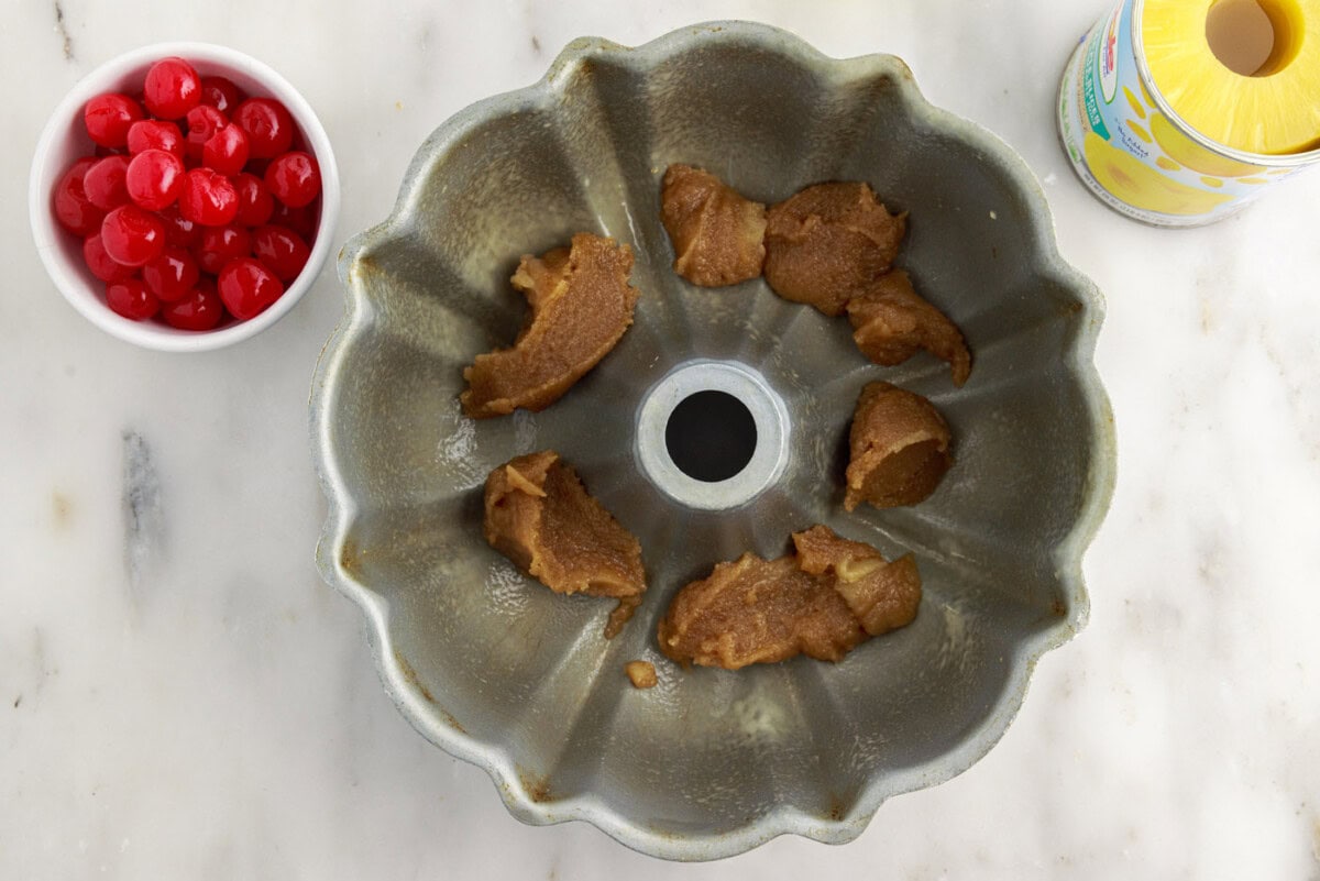 brown sugar mixture in bottom of bundt cake pan