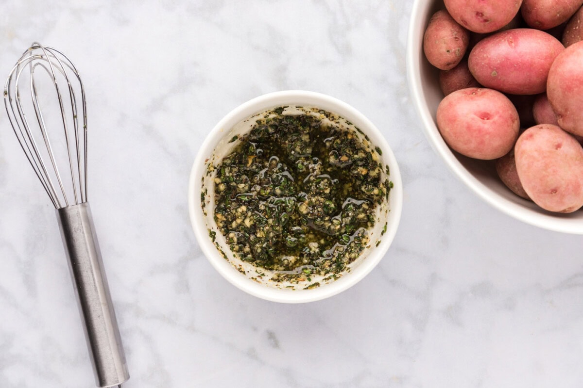 olive oil mixed with seasonings in a bowl