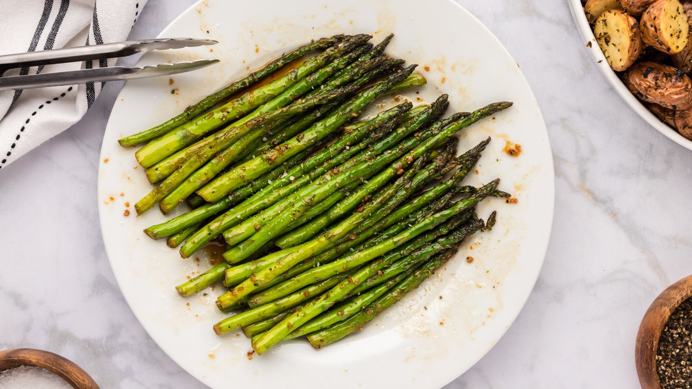 Our sauteed asparagus is tossed in soy sauce and minced garlic with a bit of salt and pepper to help