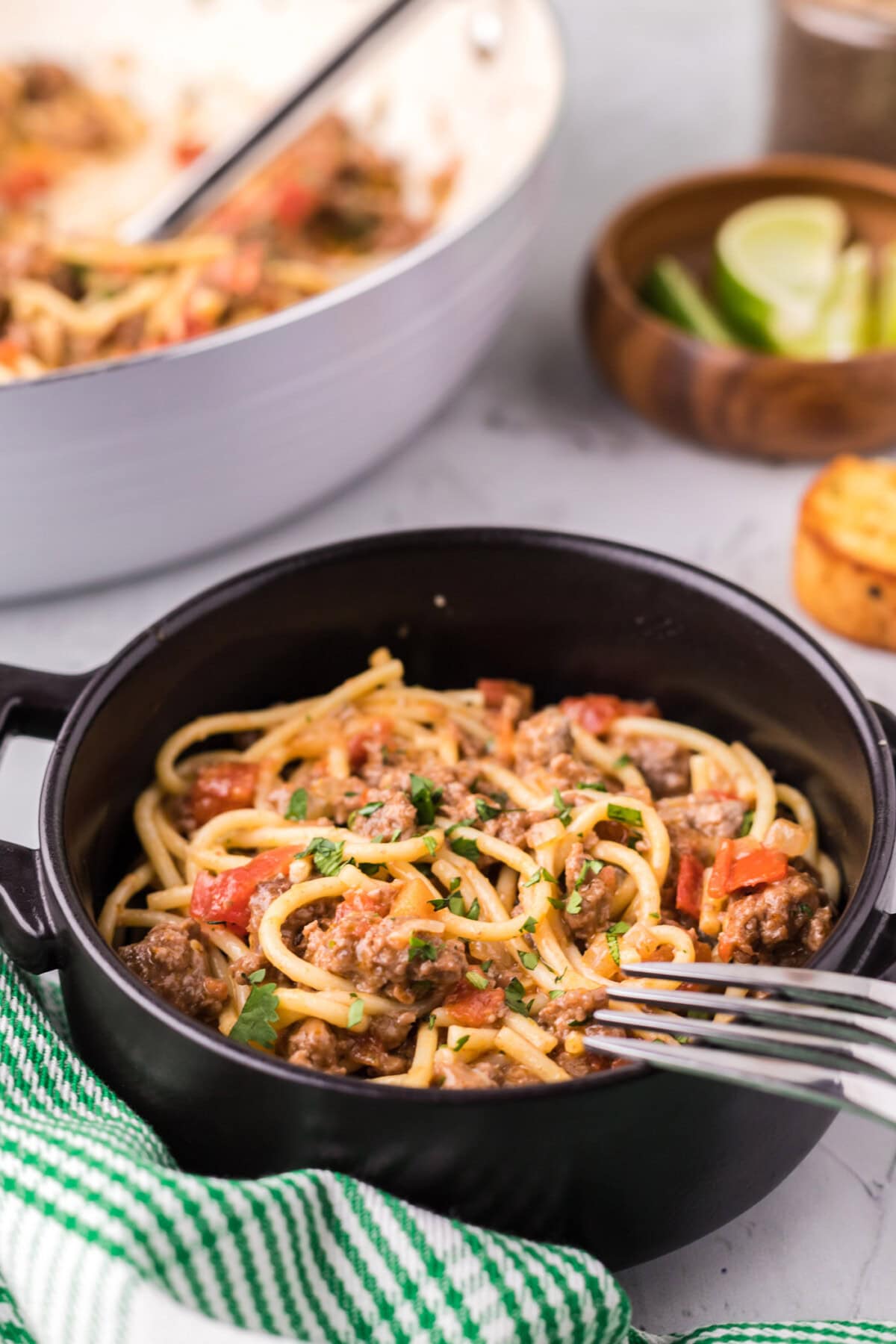 Bowl of Taco Spaghetti with a fork resting on the bowl