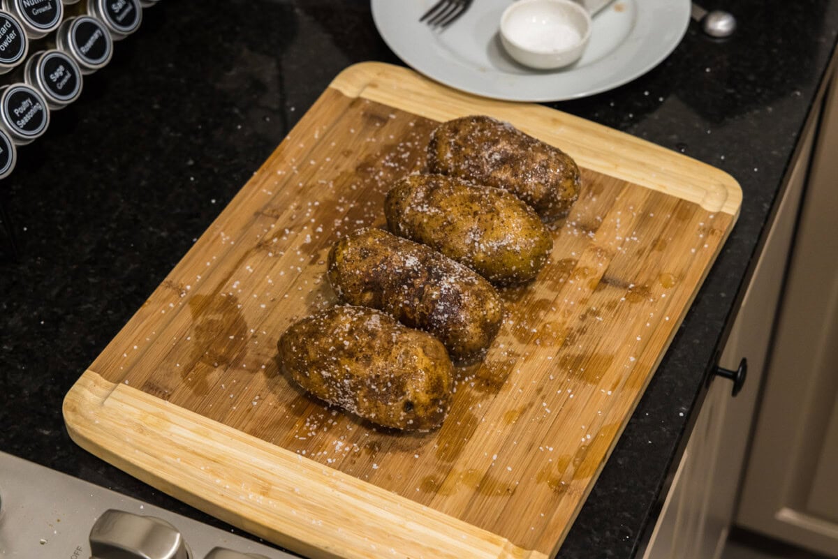 seasoned potatoes on a cutting board